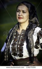 stock-photo-beautiful-woman-smiling-with-hands-on-hips-posing-in-traditional-costume-and-scarf-r.jpg