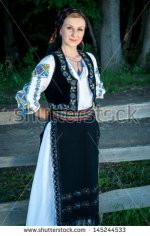 stock-photo-portrait-of-young-beautiful-woman-posing-outside-in-romanian-traditional-costume-145.jpg