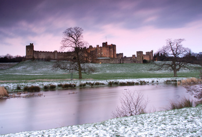 Alnwick Castle reflections in the river Aln at dawn (&copy; Gail Johnson | Dreamstime.com)