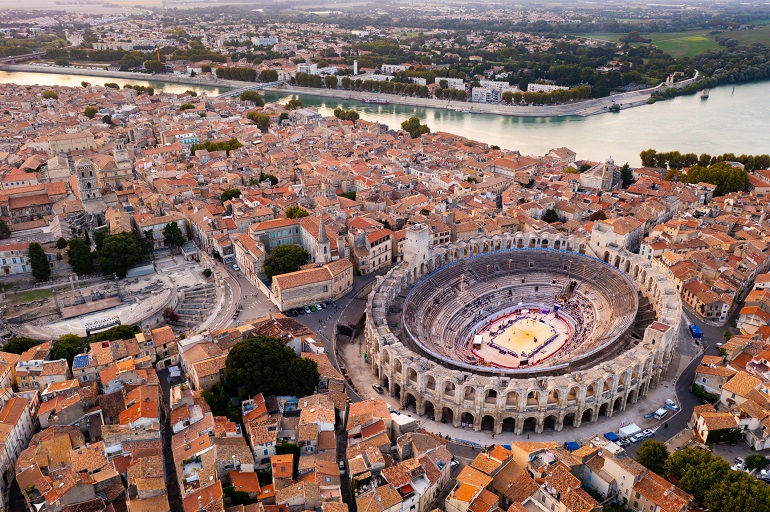 Aerial view of Arles on Rhone river overlooking Roman amphitheatre (© Iakov Filimonov | Dreamstime.com)