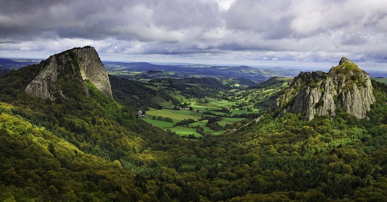 The Tuiliere Rocks (left) and The Sanadoire Rocks (right), Volcanoes of Auvergne Regional Nature Park (© Radu Razvan Gheorghe | Dreamstime.com)