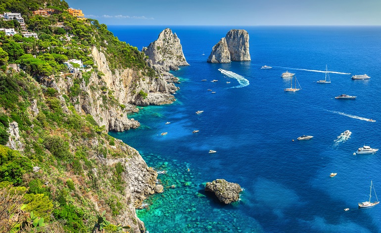 Faraglioni cliffs panorama with the majestic Tyrrhenian sea in background, Capri island (© Janoka82 | Dreamstime.com)