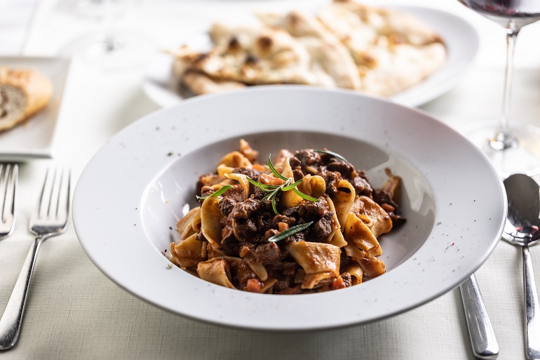 Cinghiale a ragù with pappardelle pasta (© Marian Vejcik | Dreamstime.com)