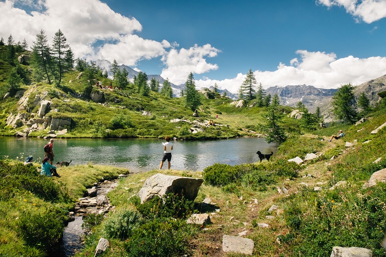 Mountain lake landscape with people near Lake Bellagarda, Gran Paradiso National Park (© Daniele Codegoni | Dreamstime.com)