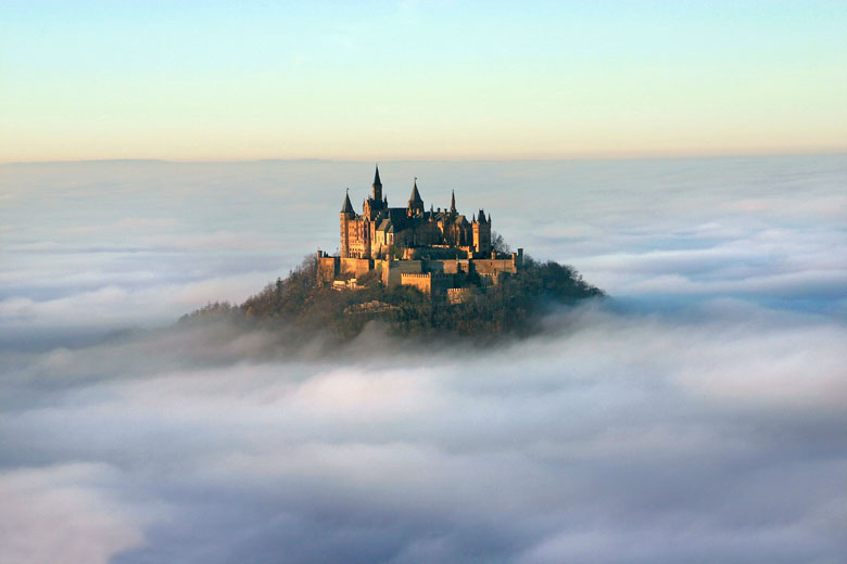 Hohenzollern Castle soaring above the clouds (© Björn Schic - Fotolia.com)