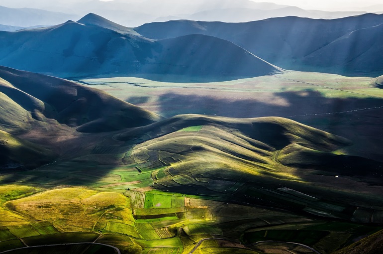 Green Valley of Castelluccio di Norcia, Monti Sibillini National Park (© Emanueleza | Dreamstime.com)