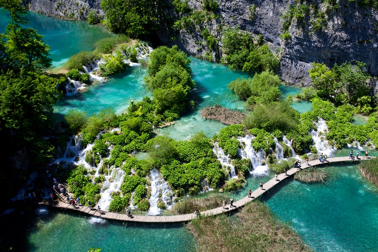 Aerial view of a footpath crossing a lake at Plitvice Lakes National Park (© Aleksei Stroganov | Dreamstime.com)