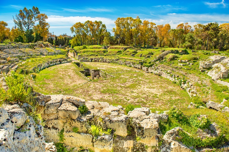 Roman Amphitheater in the Neapolis Archaeological Park, Syracuse (© travellaggio | Dreamstime.com)