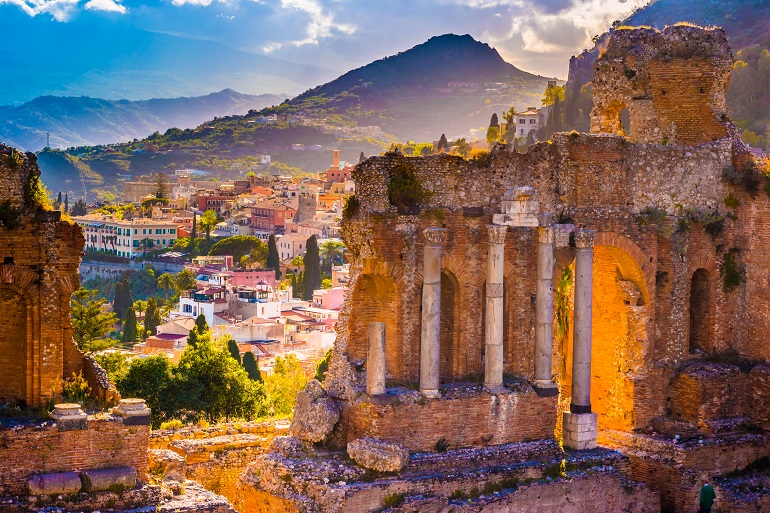The ruins of Taormina Theatre at sunset (© Romasph | Dreamstime.com)