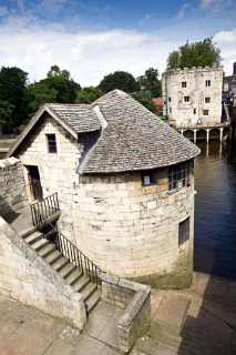 Barker Tower (near) and Lendal Tower (far) on the River Ouse, York (&copy; Steve Geer | iStockphoto.com)